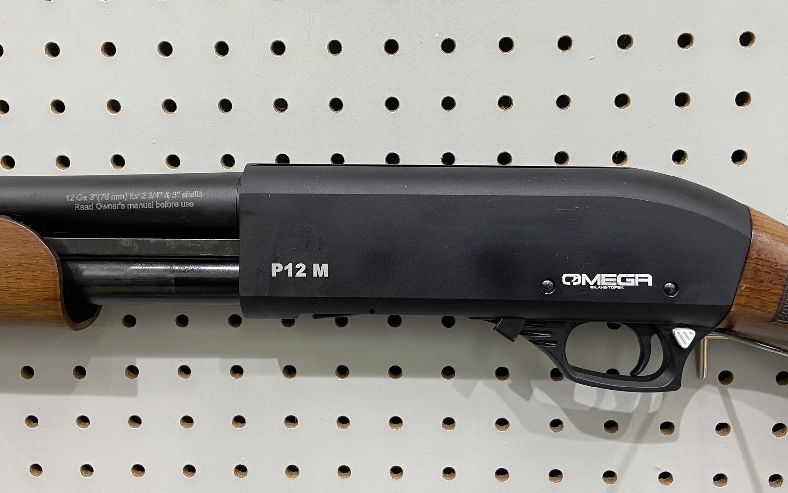 Omega P12m 12ga pump shotgun